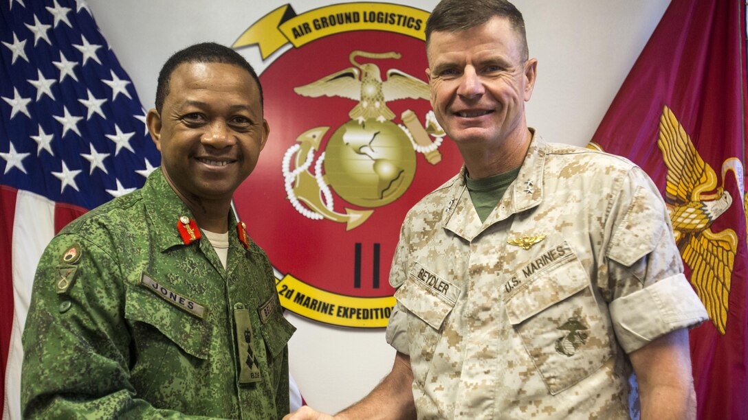 Brig. Gen David Jones, commander of the Belize Defence Force, and Maj. Gen. William Beydler, former commanding general of II Marine Expeditionary Force, meet during a visit to Marine Corps Base Camp Lejeune, N.C., Oct. 22, 2015. The purpose of the visit was to assess the capabilities of U.S. forces, discern opportunities for Belize forces to train alongside Marines and sustain enduring partnerships between the two countries in their efforts to counter transnational organized crime.  