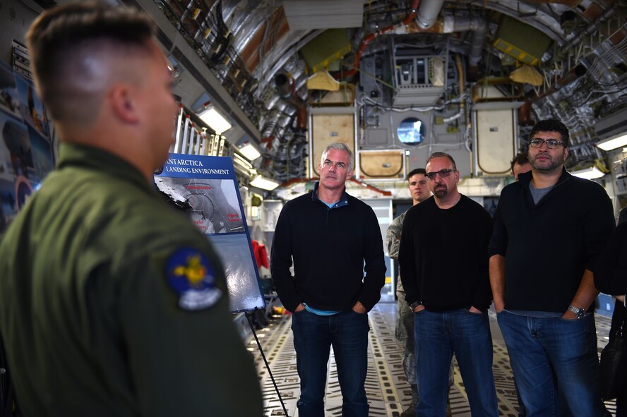 Staff Sgt. Scott Delano, 8th Airlift Squadron evaluator loadmaster, briefs Gen Next members inside a C-17 Globemaster III on the McChord Field flight line Oct. 22, 2015 at Joint Base Lewis-McChord, Wash. Gen Next is an organization of successful individuals dedicated to learning about and becoming engaged with the most pressing challenges facing future generations. (Air Force Photo/Senior Airman Naomi Griego)