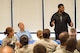 Former NFL player, Herschel Walker speaks to the Air Force Mortuary Affairs Operations team, during a visit Oct. 15, 2015 to the Charles C. Carson Center for Mortuary Affairs, Dover Air Force Base, Del. Walker expressed his gratitude to the men and women of AFMAO for the work they do for the nation’s fallen service members. (U.S. Air Force photo/Sgt. 1st Class Antwon Shaw)