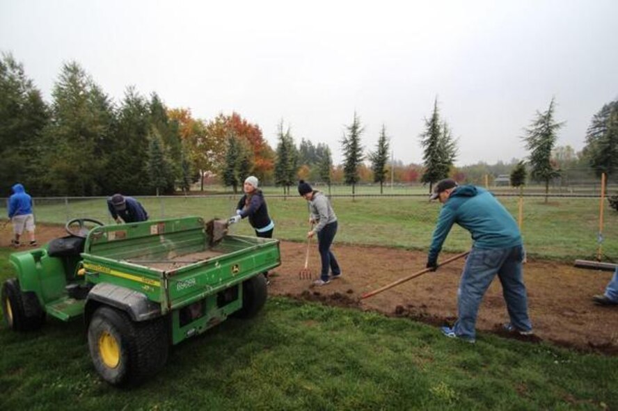 Airmen from the Joint Base Lewis-McChord’s 627th Air Base Group help fix the edging on Tumwater’s Pioneer Park baseball fields during the “Third Thursday in Thurston” Oct. 15. 