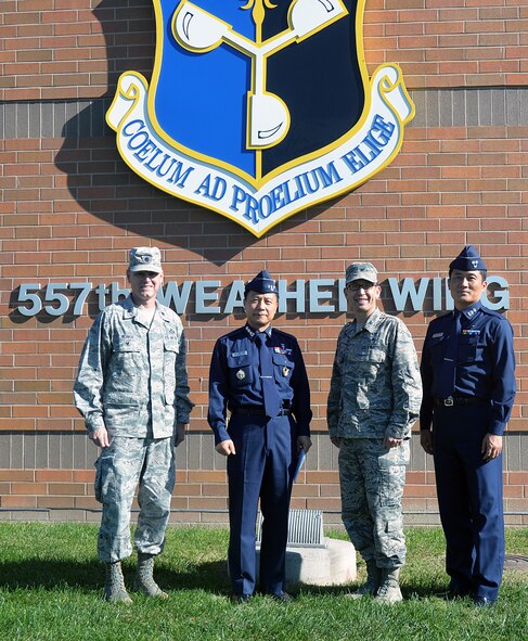 From left to right: Lt. Col. James Weaver, 2nd Weather Group deputy commander, Col. Jong Mo Kim, Republic of Korea Air Force Weather Wing commander, Col. William Carle, 557th WW commander, and Lt. Col. Sung-Hoon An, ROKAF WW, stand for a photo outside the 557th WW building Oct.14 on Offutt Air Force Base, Neb. This was Col. Jong Mo Kim’s first visit since talking commander and also the first visit from the ROKAF since the changeover from the Air Force Weather Agency to the 557th WW.  (U.S. Air Force photo by Kendra Wilkinson/Released)