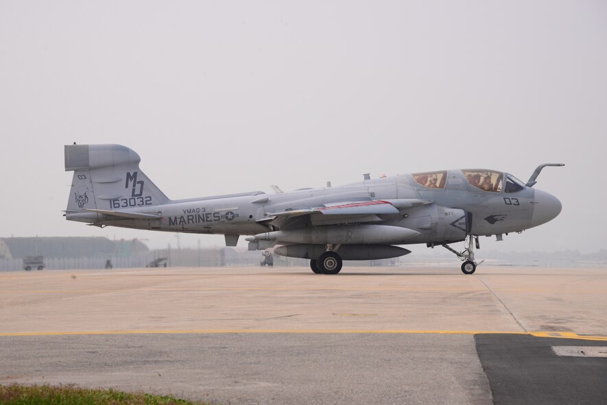 An EA-6B Prowler assigned to Marine Tactical Electronic Warfare Squadron 4, VMAQ-4, taxis toward the runway Oct. 16, 2015, at Osan Air Base, Republic of Korea. The Marines are participating in exercise Pacific Thunder 15-02. More than 10 different organizations and squadrons came together to participate in the two-week exercise. (U.S. Air Force photo by Staff Sgt. Benjamin Sutton) 