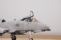 A pilot taxis an A-10 Thunderbolt II along the runway of Osan Air Base, Republic of Korea Oct. 16, 2015. A-10s from the 25th Fighter Squadron participated in the combat search and rescue exercise Pacific Thunder 15-02. Exercise Pacific Thunder brought together U.S. forces from the Air Force, Marines, and units from the Republic of Korea air force to practice air combat and CSAR by focusing on enhancing interoperability and combat readiness of the military alliance across the Korean Peninsula. (U.S. Air Force photo by Staff Sgt. Benjamin Sutton)