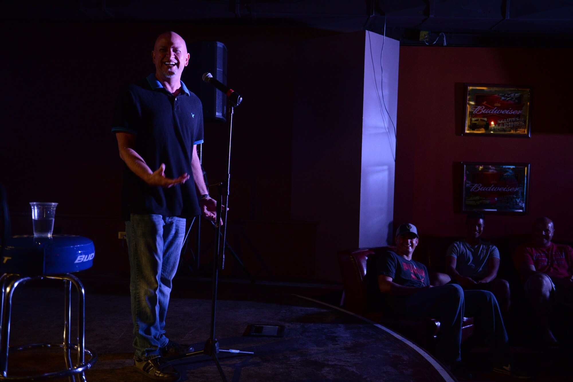 Don Barnhart, a stand-up comedian, tells a joke to more than 70 service members and their families Oct. 21, 2015, at Andersen Air Force Base, Guam. Barnhart is part of an Armed Forces Entertainment-sponsored comedy group touring military installations to improve morale and bring laughter to the troops. (U.S. Air Force photo by Airman 1st Class Alexa Ann Henderson/Released)