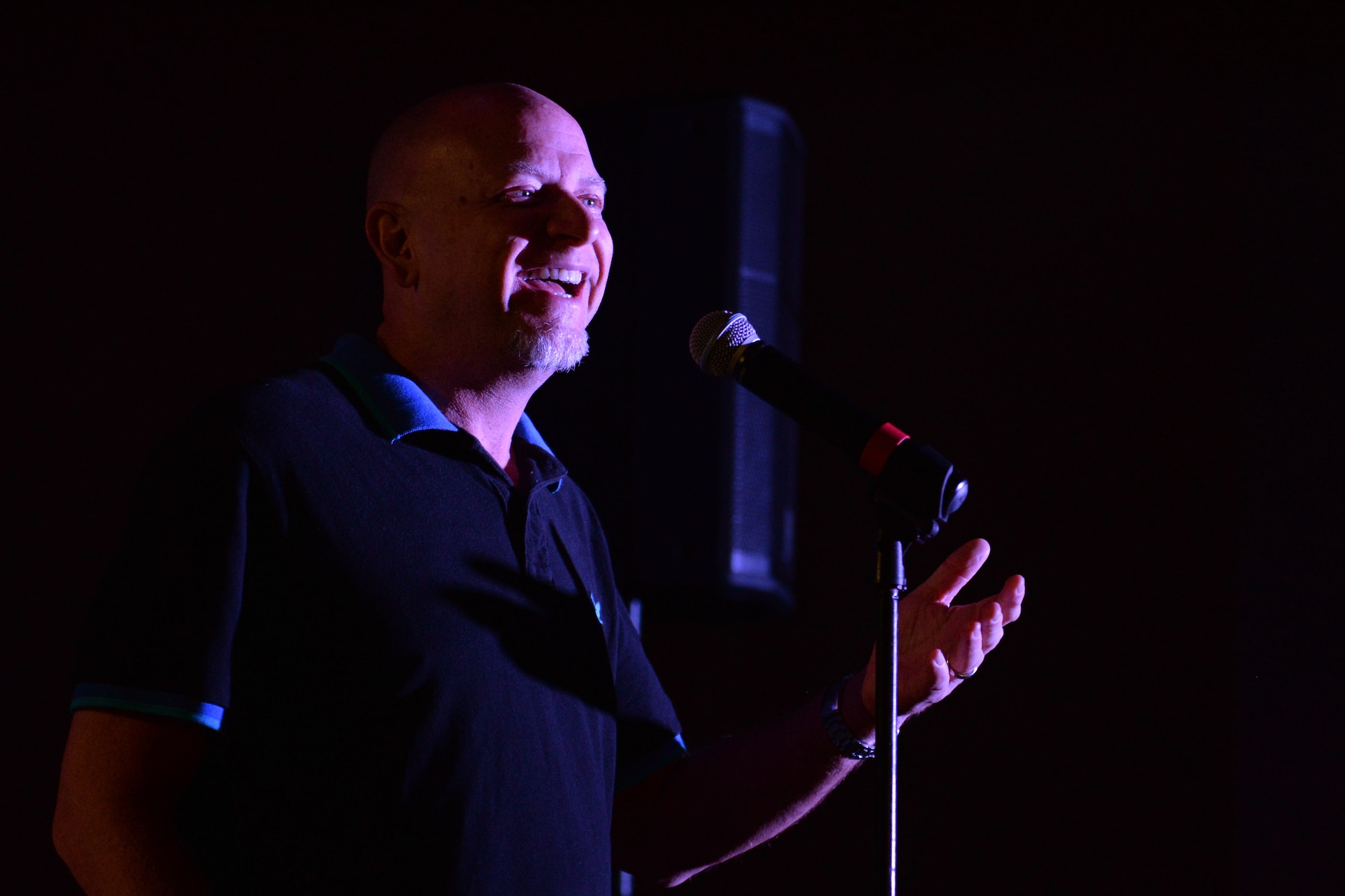 Don Barnhart, a stand-up comedian, tells a story to more than 70 service members and their families Oct. 21, 2015, at Andersen Air Force Base, Guam. Barnhart is part of an Armed Forces Entertainment-sponsored comedy group touring military installations to improve morale and bring laughter to the troops. (U.S. Air Force photo by Airman 1st Class Alexa Ann Henderson/Released)