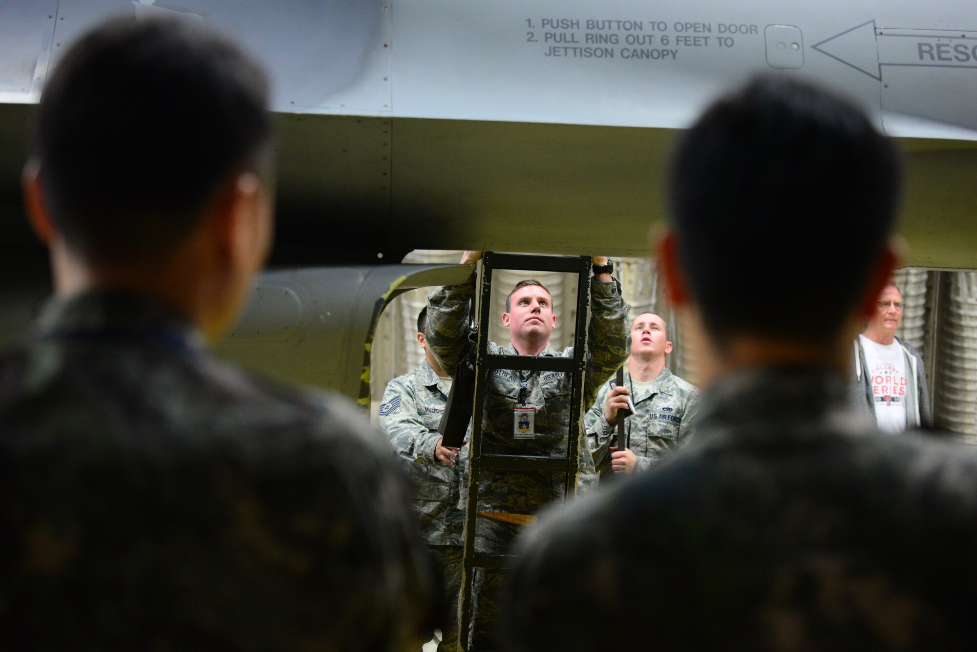 Staff Sgt. Justin Gautreau, 51st Maintenance Group quality assurance manager, assists in running a weight and balance test an a F-16 Fighting Falcon as members of the Republic of Korea Air Force observe at Osan Air Base, Republic of Korea, Oct. 14, 2015. The ROKAF joined up with U.S. Air Force quality assurance technicians to learn how to properly weigh and balance aircraft systems.
(U.S. Air Force photo/Staff Sgt. Amber Grimm)