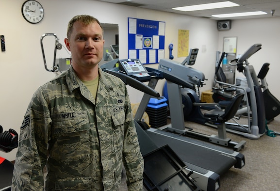 U.S. Air Force Staff Sgt. Michael White, a 354th Medical Group physical therapy technician, takes a break from his busy day Oct. 22, 2015, at Eielson Air Force Base, Alaska. White said his favorite part of his job is helping people heal so they can continue to fight for the mission at hand. (U.S. Air Force photo by Airman 1st Class Cassandra Whitman/Released)