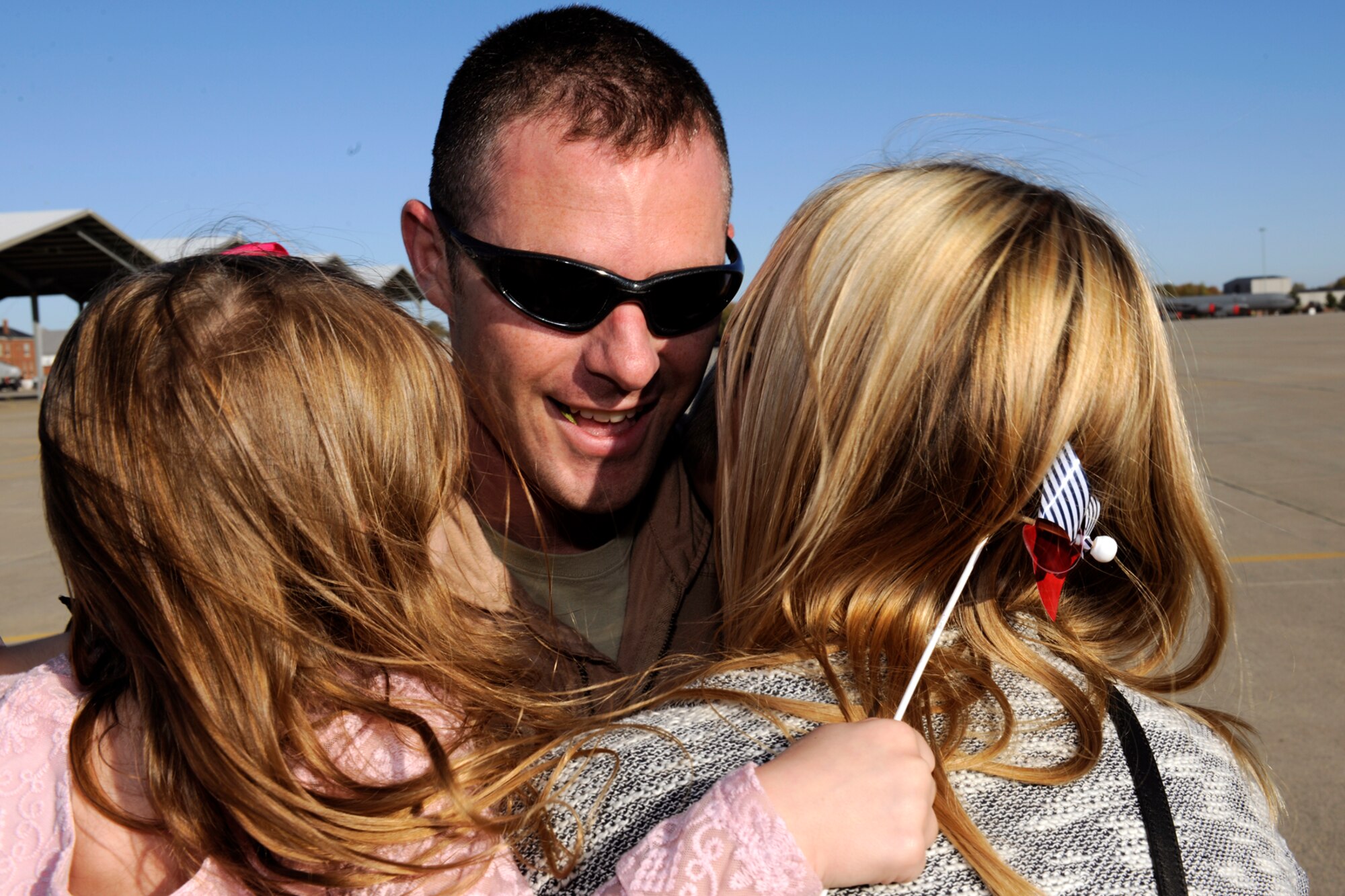 151022-Z-EZ686-352 – A pilot with the 127th Wing's 107th Fighter Squadron from Selfridge Air National Guard Base, Mich., reunites with his family after a six month deployment on October 22, 2015.  Ten A-10 Thunderbolt II aircraft returned from a six month deployment to Southwest Asia in support of U.S. Central Command’s Operation Inherent Resolve.   (U.S. Air National Guard photo by Master Sgt. David Kujawa)