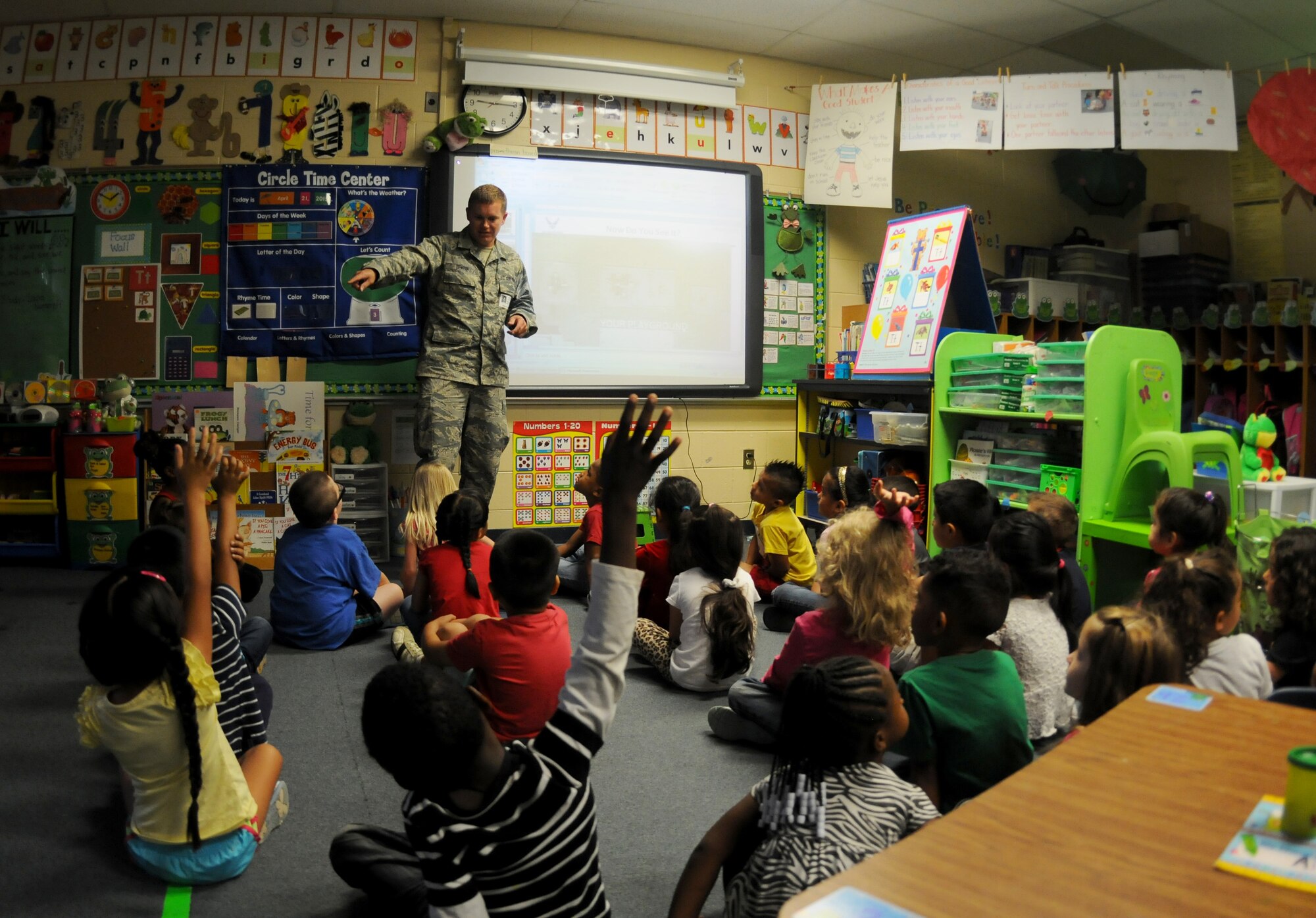 Master Sgt. Paul Denton, 188th Wing, answers questions from students at Sutton Elementary, Fort Smith, Ark., during Career Day Oct. 9, 2015. The 188th Wing has partnered with Sutton Elementary to provide a positive influence to children within the community. (U.S. Air National Guard photo by Senior Airman Cody Martin/Released)