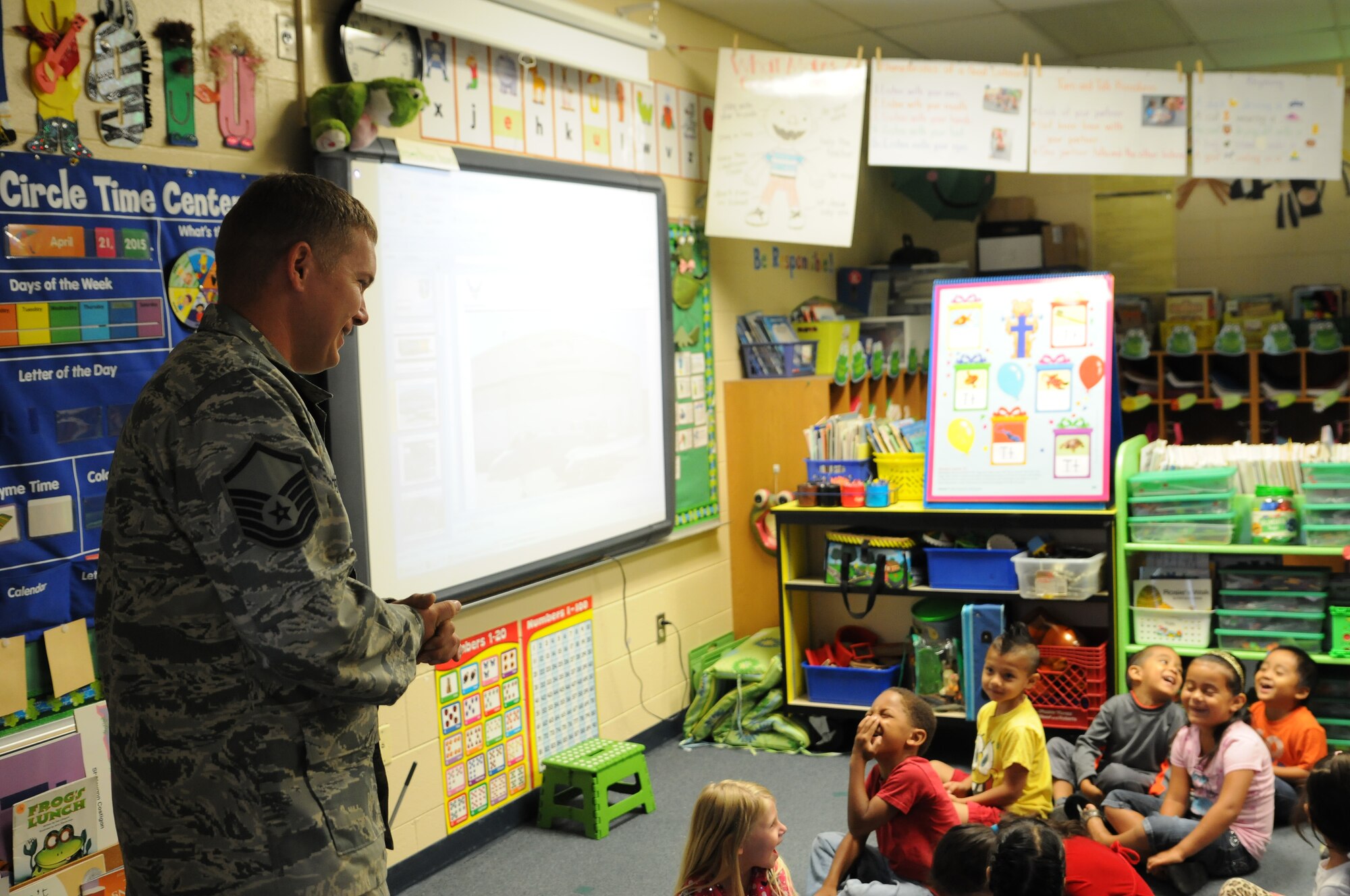Master Sgt. Paul Denton, 188th Wing, answers questions from students at Sutton Elementary, Fort Smith, Ark., during Career Day Oct. 9, 2015. The 188th Wing has partnered with Sutton Elementary to provide a positive influence to children within the community. (U.S. Air National Guard photo by Senior Airman Cody Martin/Released)