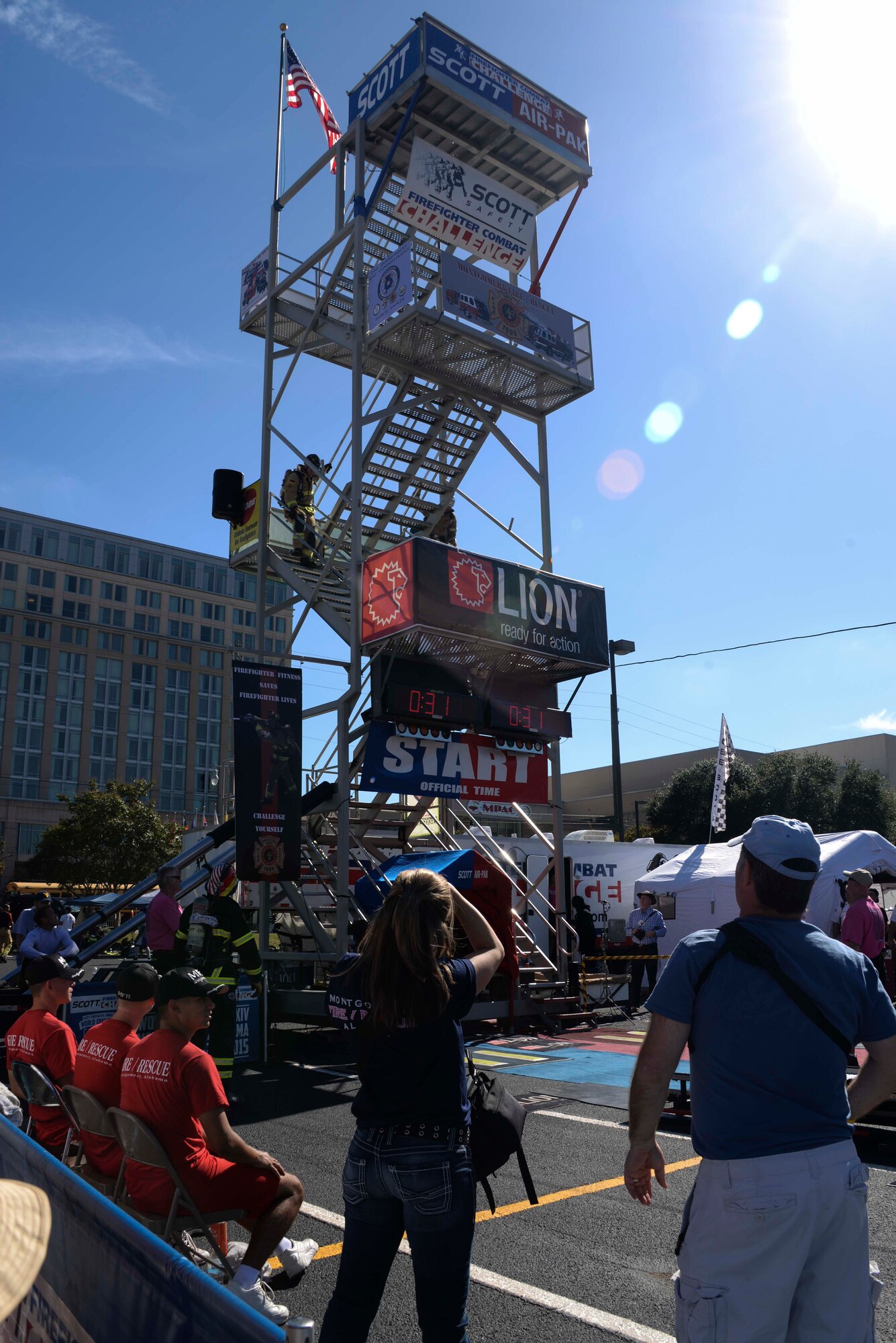 Competitors climb the 5-story tower during the 2015 World Scott Fire Fighter Combat Challenge, Oct. 20, 2015, in Montgomery, Alabama. The 2015 World Scott Combat Fire Fighter Combat Challenge is an international competition that brings fire fighters from 25 different locations around the world to compete in obstacles that simulate real-life fire rescue tasks. (U.S. Air Force photo by Airman 1st Class Alexa Culbert)