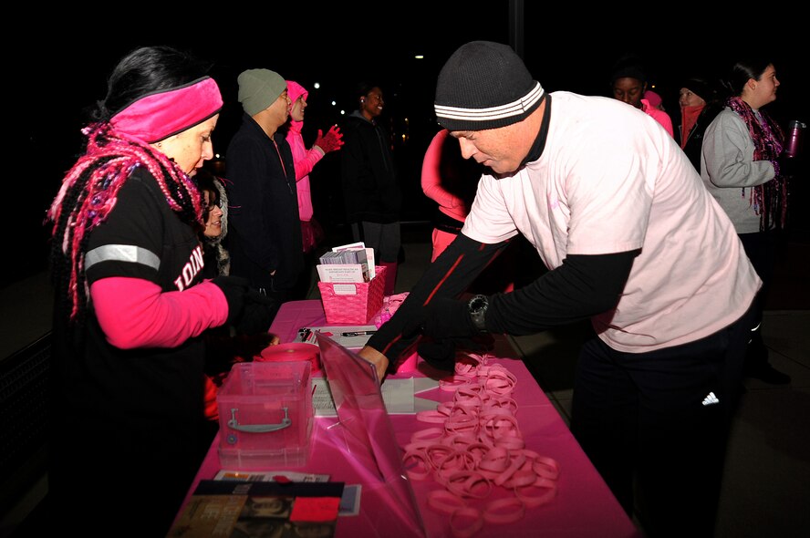Maj. Scott Leblanc, 319th Medical Group, registers for the Pink Run on Grand Forks Air Force Base, North Dakota, Oct. 22, 2015. The Pink Run was an event sponsored by the 319th Medical Group to promote breast cancer awareness. (U.S. Air Force photo/Airman 1st Class Bonnie Grantham/Released)