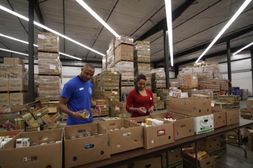 Airmen from the Joint Base Lewis-McChord’s 627th Air Base Group help fix the edging on Tumwater’s Pioneer Park baseball fields during the “Third Thursday in Thurston” Oct. 15. 
