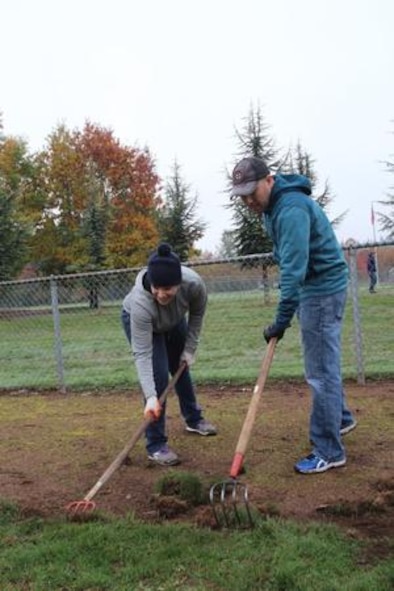 Airmen from the Joint Base Lewis-McChord’s 627th Air Base Group help fix the edging on Tumwater’s Pioneer Park baseball fields during the “Third Thursday in Thurston” Oct. 15. 