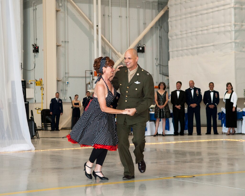 U.S. Air Force Col. Michael Bob Starr, 7th Bomb Wing commander, and his wife, Kim, lead the first dance of the evening during the Air Force Ball Oct. 17, 2015, at Dyess Air Force Base, Texas. The ball is an Air Force-wide, annual tradition where Airmen build morale while reflecting on their history and heritage. It is also a way to celebrate Airmen and their families and thank them for everything they do when contributing to the Air Force mission to fly, fight and win. (U.S. Air Force photo by Airman 1st Class Austin Mayfield/Released)