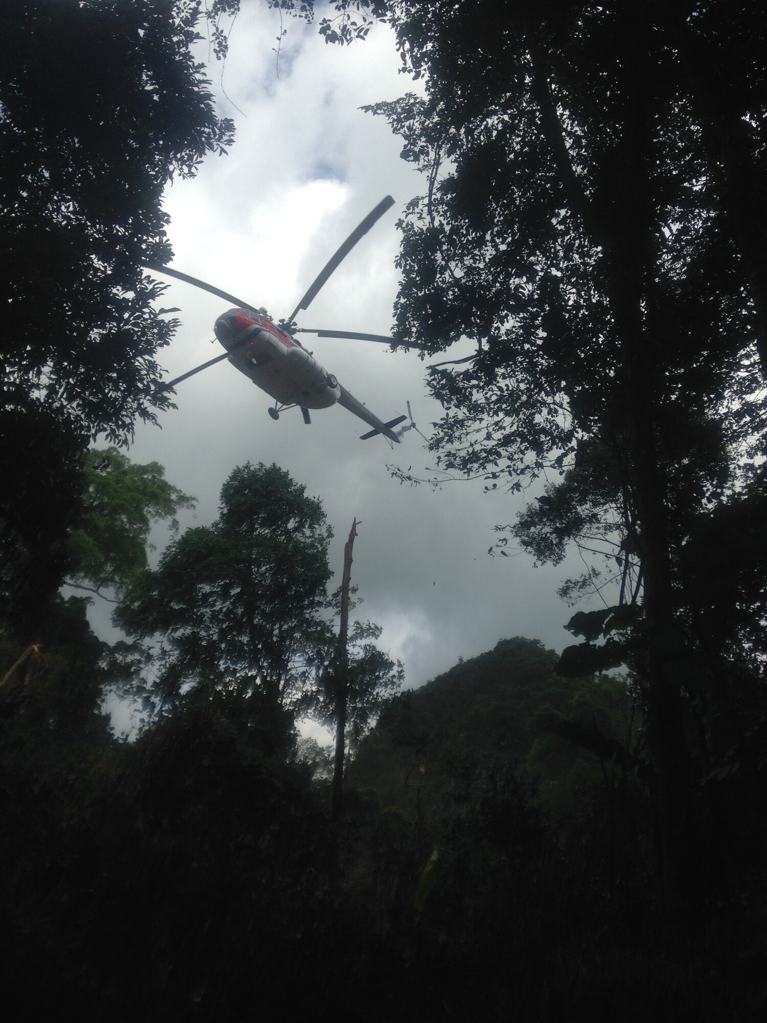 A Vietnamese helicopter leaves after dropping off AFN's MC2(SW) Billy Ho on his mission to account for U.S. Service members currently listed as POW or MIA since the Vietnam War (DPAA Photo)