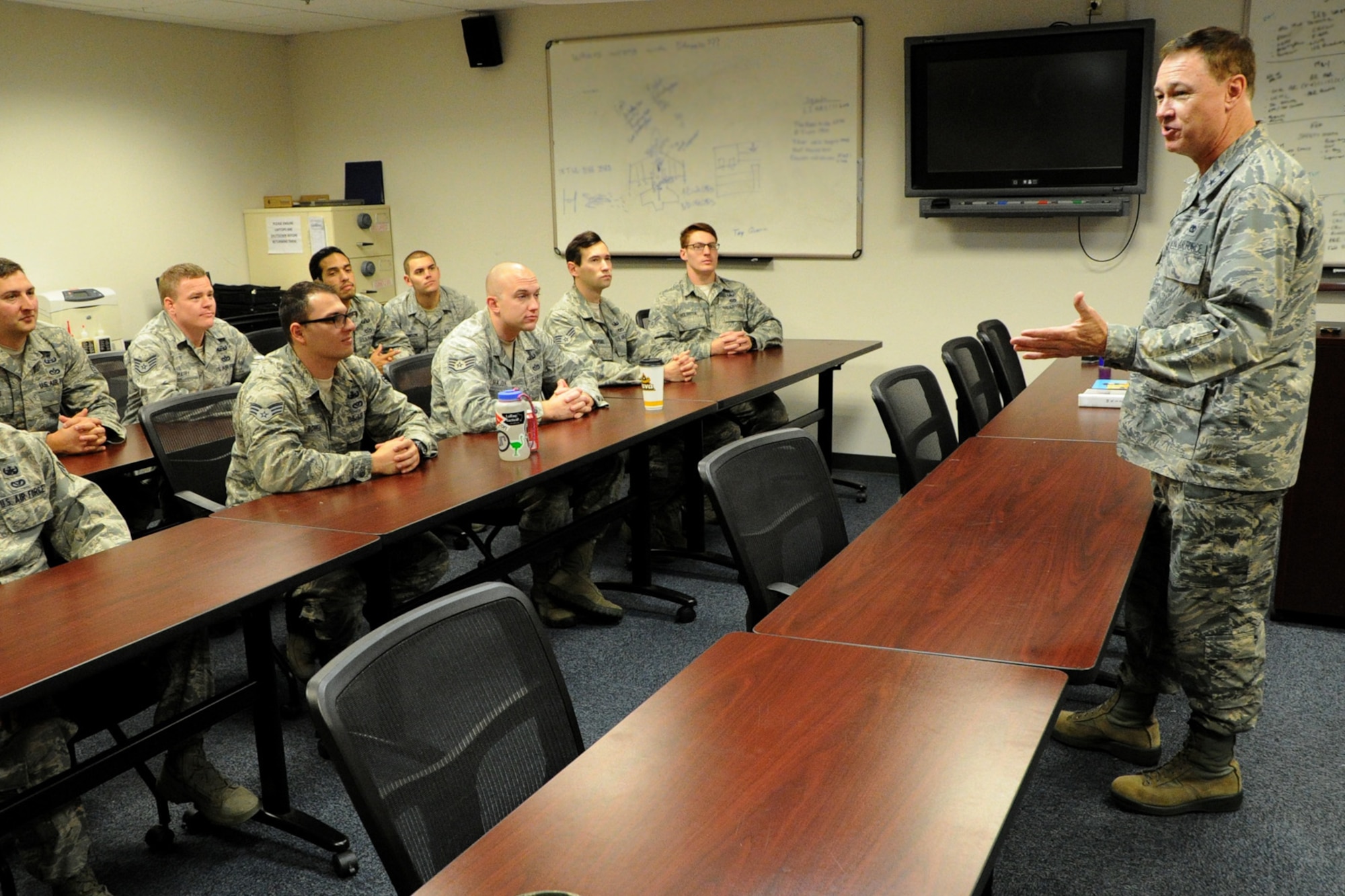 Air Force District of Washington Commander Maj. Gen. Darryl W. Burke speaks to Explosive Ordnance Disposal Airmen from the 11th Civil Engineer Squadron on Joint Base Andrews, Md., Oct. 23, 2015. Burke communicates his appreciation for the EOD Airmen’s sacrifice for the mission and recognized excellence within their career field. (U.S. Air Force photo/Staff Sgt. Matt Davis)