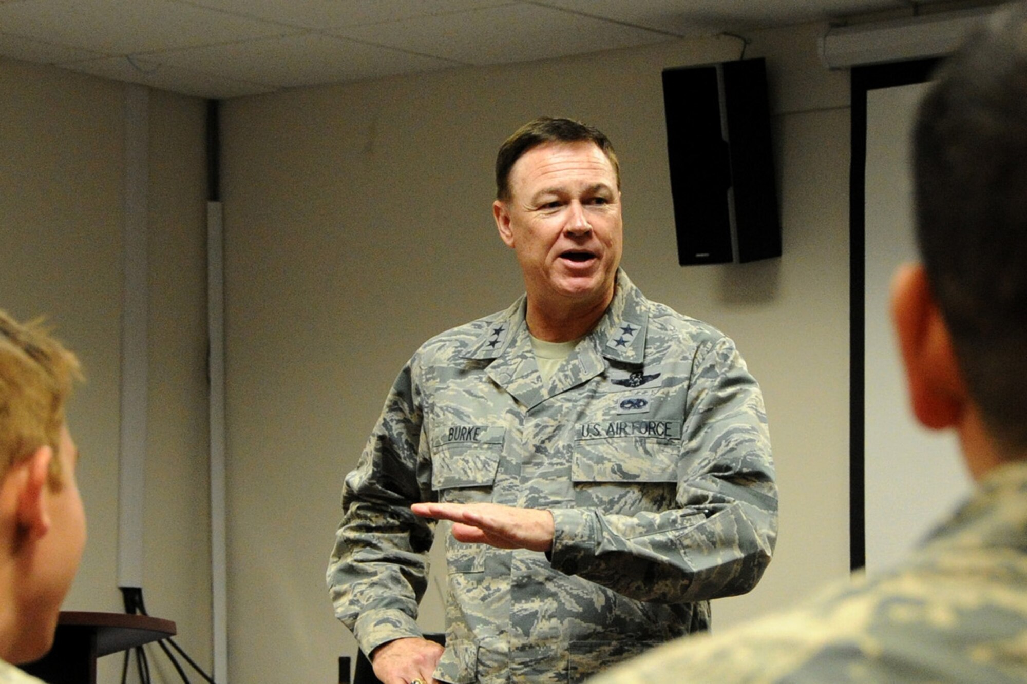 Air Force District of Washington Commander Maj. Gen. Darryl W. Burke speaks to Explosive Ordnance Disposal Airmen from the 11th Civil Engineer Squadron on Joint Base Andrews, Md., Oct. 23, 2015. Burke communicates his appreciation for the EOD Airmen’s sacrifice for the mission and recognized excellence within their career field. (U.S. Air Force photo/Staff Sgt. Matt Davis)