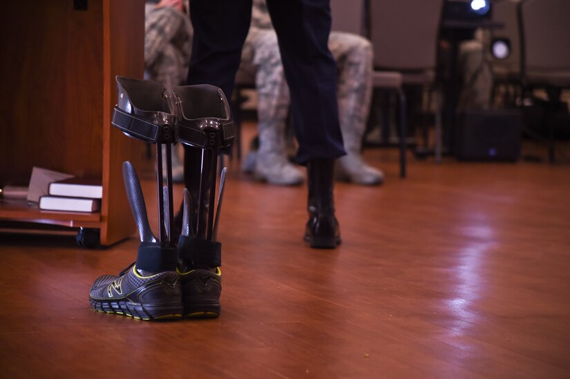Tech. Sgt. Alex Eudy, Special Operations weather team craftsman and recovering warrior, speaks at the Community Commons on Joint Base Andrews, Oct. 22, 2015, for Disability Employment Awareness Month. Eudy returned to Active Duty after he was injured in Afghanistan, and now uses intrepid dynamic exoskeleton orthotics.(Photo by Senior Airman Mariah Haddenham/Released)