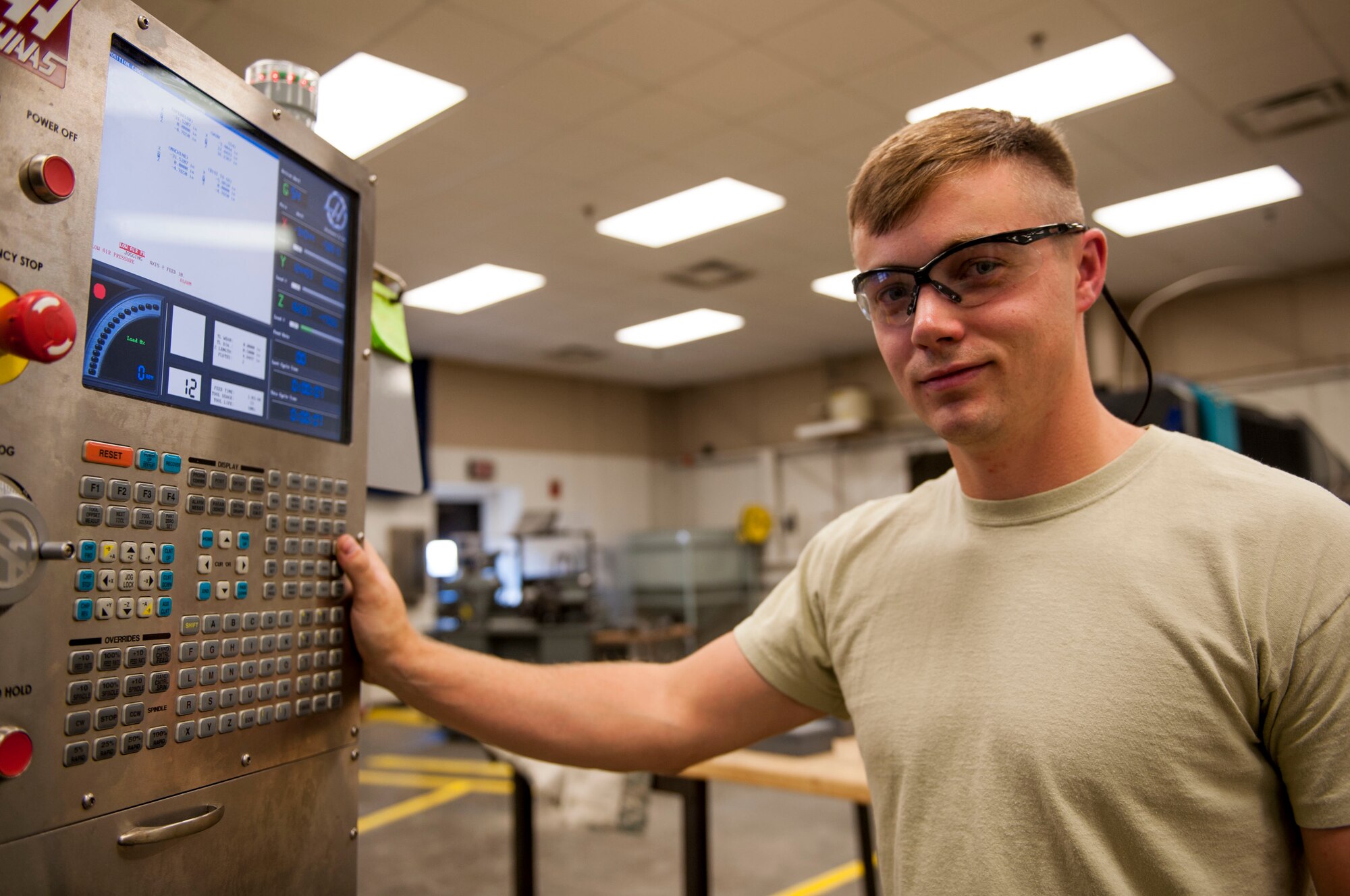 U.S. Air Force Senior Airman Dustin Blakney, a 19th Maintenance Squadron aircraft metals technology journeyman, was named Combat Airlifter of the Week Oct. 19, 2015, on Little Rock Air Force Base, Ark. Blakney, an Adamsville, Tenn., native, authored a C-130J computerized numeric milling program to manufacture nine core bolt spacers, an asset that is hard to produce and unavailable through supply channels.  (U.S. Air Force photo by Senior Airman Stephanie Serrano)