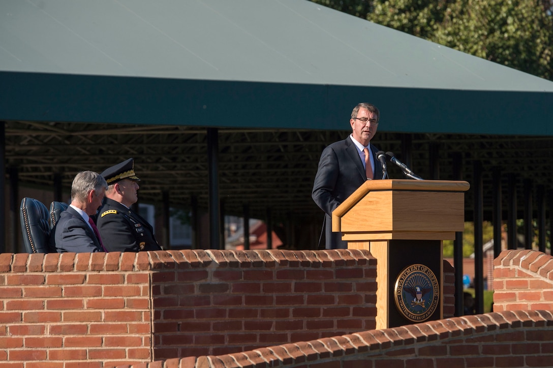 Defense Secretary Ash Carter delivers remarks at a farewell ceremony honoring Army Secretary John M. McHugh on Joint Base Myer-Henderson Hall, Va., Oct. 23, 2015. DoD photo by Air Force  Senior Master Sgt. Adrian Cadiz