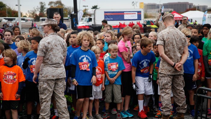 Children wait for the start of the Marine Corps Marathon Kid’s Run Oct. 24, 2015, at the Pentagon in Arlington, Virginia. More than 3,500 Children participated in the one-mile event. The run is organized to promote physical fitness and morale for the children and the community. 
