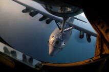 A U.S. Air Force C-130 Hercules from RAF Mildenhall, England, takes on fuel from a KC-135 Stratotanker from RAF Mildenhall, England, Oct. 22, 2015, over the Atlantic Ocean. The two aircraft were training in exercise Trident Juncture, an exercise designed to help militaries respond more effectively to regional crises with NATO allies and partners – improving security of borders, ensuring energy security and countering threats of terrorism. (U.S. Air Force photo by Senior Airman Christine Halan/Released)