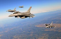 U.S. Air Force F-16 Fighting Falcons from Spangdahlem Air Base, Germany, fly in formation, Oct. 22, 2015, over Spain. The aircraft received fuel from a KC-135 Stratotanker from RAF Mildenhall, England, as part of Exercise Trident Juncture. (U.S. Air Force photo by Senior Airman Christine Halan/Released)