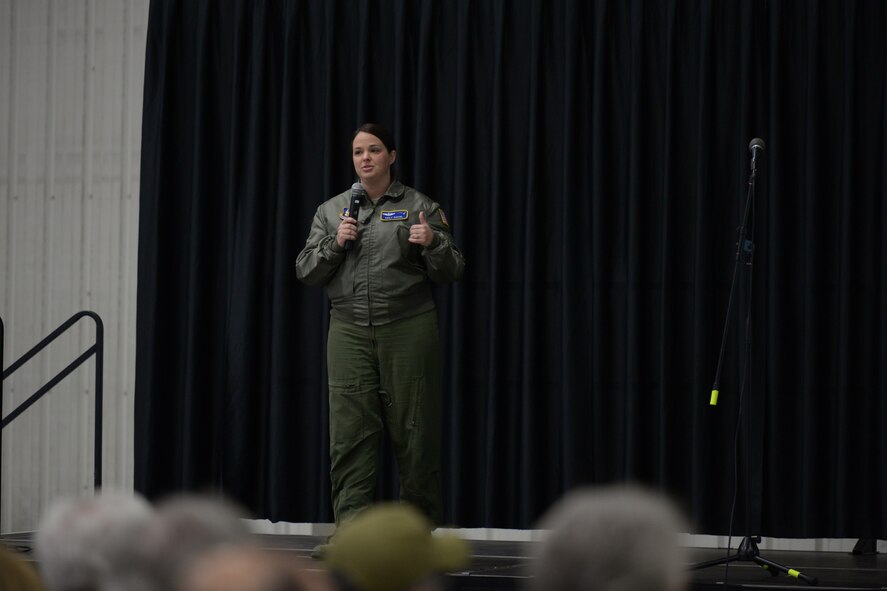 Maj. Emily Koziol, Chief of Safety for the 439th Airlift Wing at Westover Air Reserve Base, M.A. talks to attendees of the New England Mid-Air Collision Avoidance seminar at Portsmouth International Airport, Portsmouth, N.H. October 25, 2015. The seminar brought together military members and civilians to discuss how to avoid mid-air collisions between military and civilian aircrafts and to give civilian pilots an insight in to military aircrafts, operations and flight patterns. (N.H. Air National Guard photo by Airman Ashlyn J. Correia/Released) 