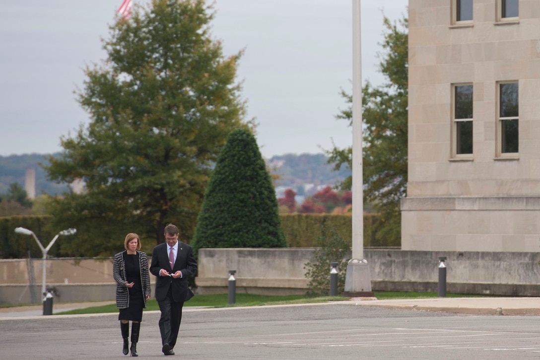 Defense Secretary Ash Carter and his wife Stephanie depart the Pentagon to attend the dignified transfer of U.S. Army Master Sgt. Joshua L. Wheeler at Dover Air Force Base, Del., Oct. 24, 2015. DoD photo by Air Force Senior Master Sgt. Adrian Cadiz