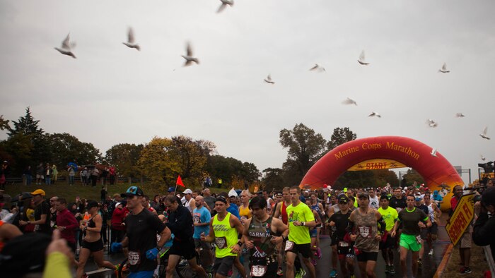 More than 30, 000 men and women from all over the world start the 40th Marine Corps Marathon in Arlington, Virginia, Oct. 25. This year’s participants joined the 512,370 runners who have completed the “Peoples Marathon” since its inaugural event in 1976.