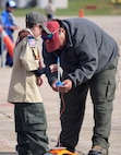 Hundreds of Cradle of Liberty Council Scouts, Scout leaders, parents, and new Scout prospects teamed with 111th Attack Wing members and Friends of the Airman and Family Readiness volunteers for a day of aviation education, food, music and model rocketry at the Horsham Air Guard Station, Pennsylvania, Oct. 24, 2015. The weather would not disappoint as very light winds and crisp fall air beckoned the amateur rocket builders to the 20 launch pads on the tarmac. (U.S. Air National Guard photo by Master Sgt. Christopher Botzum/Released)    
