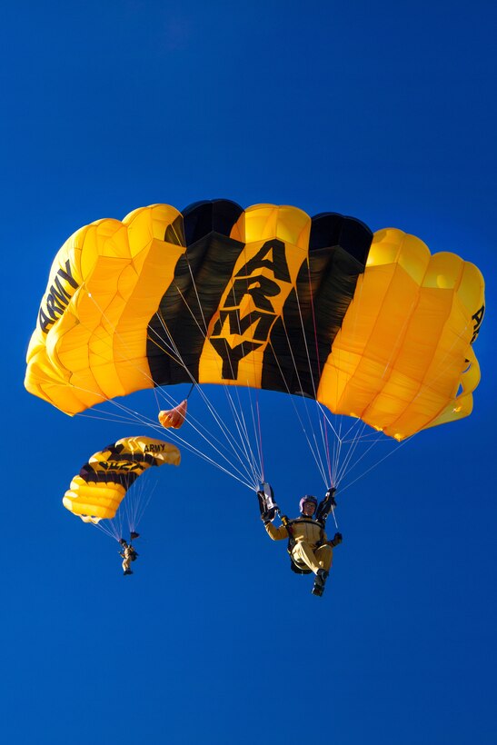 Army Sgt. Dustin Gebhart, right, and Sgt. 1st Class Cory Rush perform precision landings during tryouts for the U.S. Army Parachute Team the Golden Knights in Laurinburg, N.C., Oct. 20, 2015. U.S. Army photo by Staff Sgt. David Meyer
