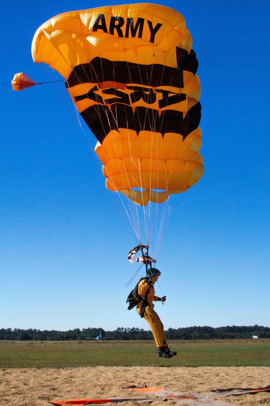 Army Sgt. Shana Greene glides to a target landing spot during precision landing practice in Laurinburg, N.C., Oct. 20, 2015. She is a candidate trying out for the U.S. Army Parachute Team the Golden Knights. U.S. Army photo by Staff Sgt. David Meyer