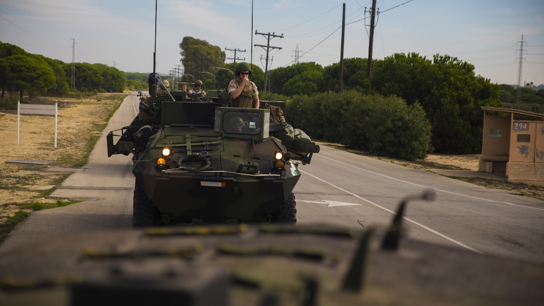 Marines with 4th Light Armored Reconnaissance Battalion, 4th Marine Division, Marine Forces Reserve, conduct a road march in light armored vehicles in Rota, Spain, Oct. 23, 2015, in support of Exercise Trident Juncture 2015, the largest NATO exercise in the past 10 years. Participating in an exercise of this magnitude allows Reserve Marines to gain real-world experience within their military occupational specialty and demonstrates their readiness in conjunction with other foreign nationals.