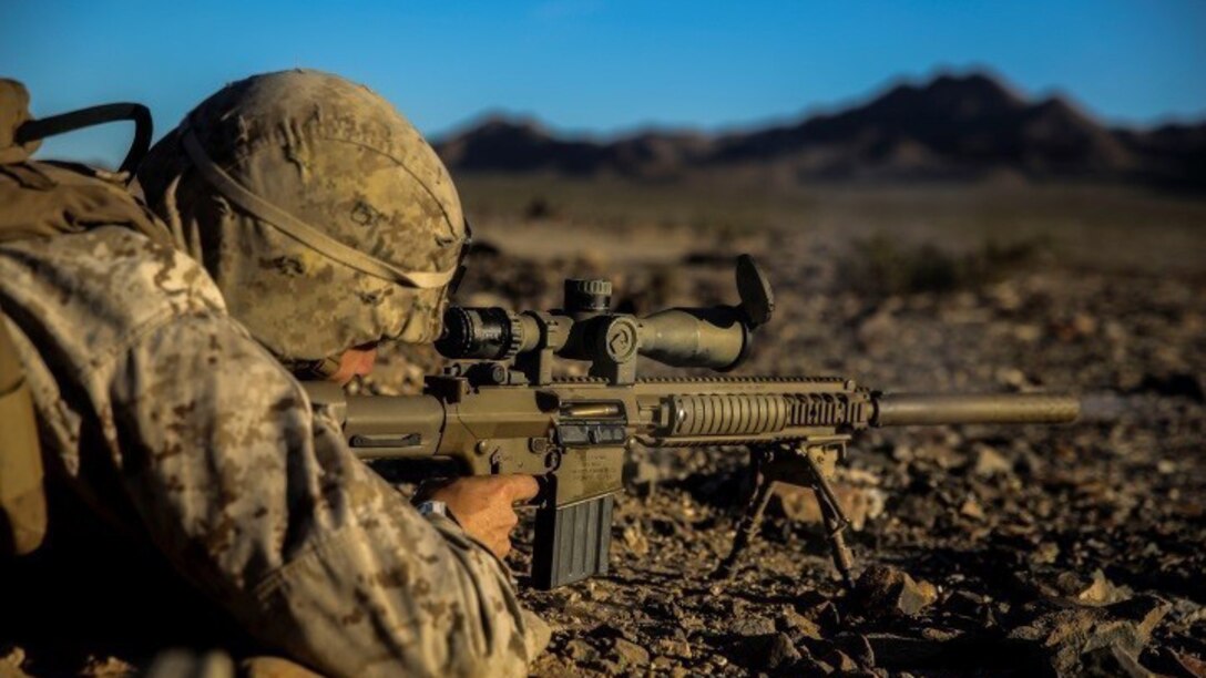 A Marine with 1st Battalion, 8th Marine Regiment pauses as he fires during the sniper marksmanship assessment as part of Integrated Training Exercise 1-16 aboard Marine Air Ground Combat Center, Twentynine Palms, Calif., Oct. 24, 2015. During ITX, Marines demonstrate core infantry mission essential tasks while conducting offensive and defensive stability operations. (U.S. Marine Corps photo by Cpl. Immanuel M. Johnson/Released)