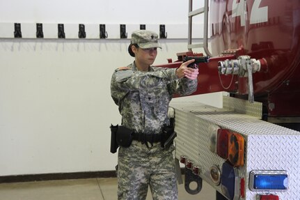 U.S. Army Reserve Spc. Taylor Taylor, a military police Soldier from the 363rd Military Police Company out of Grafton, West Virginia, participates in a building clearing exercise for active shooter training alongside Austrian soldiers assigned to the Kosovo Force International Military Police, and U.S. Army military working dogs and handlers, Sept. 30, 2015, on Camp Bondsteel, Kosovo. Taylor’s unit is currently deployed to Kosovo with Multinational Battle Group-East, part of NATO’s KFOR peace support mission. The day’s training was conducted to ensure the military police teams are familiar with military working dog procedures while responding to active-shooter or explosive ordnance situations. (U.S. Army photo by Sgt. Erick Yates, Multinational Battle Group-East)