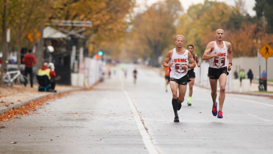 Marines participating in the 40th Marine Corps Marathon run next to the National Mall in Washington, D.C., Oct. 25, 2015. U.S. Marine Corps photo by Sgt. Terence Brady

