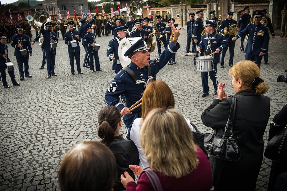 Master Sgt. Steve Przyzycki, U.S. Air Forces in Europe Band percussionist, counts down for the crowd during a marching band performance in Kvareli, Georgia, Oct. 18, 2015. From Oct. 15-19, 33 bandsmen from the U.S. Air Forces in Europe Band traveled to the Republic of Georgia for several events including performing in the First International Military Bands Festival in Tbilisi. This is the first time in nearly 10 years that the USAFE Band has traveled to conduct a mission in the Republic of Georgia. Georgia and the U.S. are proven military partners and engagements like these help to further strengthen the bonds between our two nations. U.S. Air Force photo by Tech. Sgt. Ryan Crane