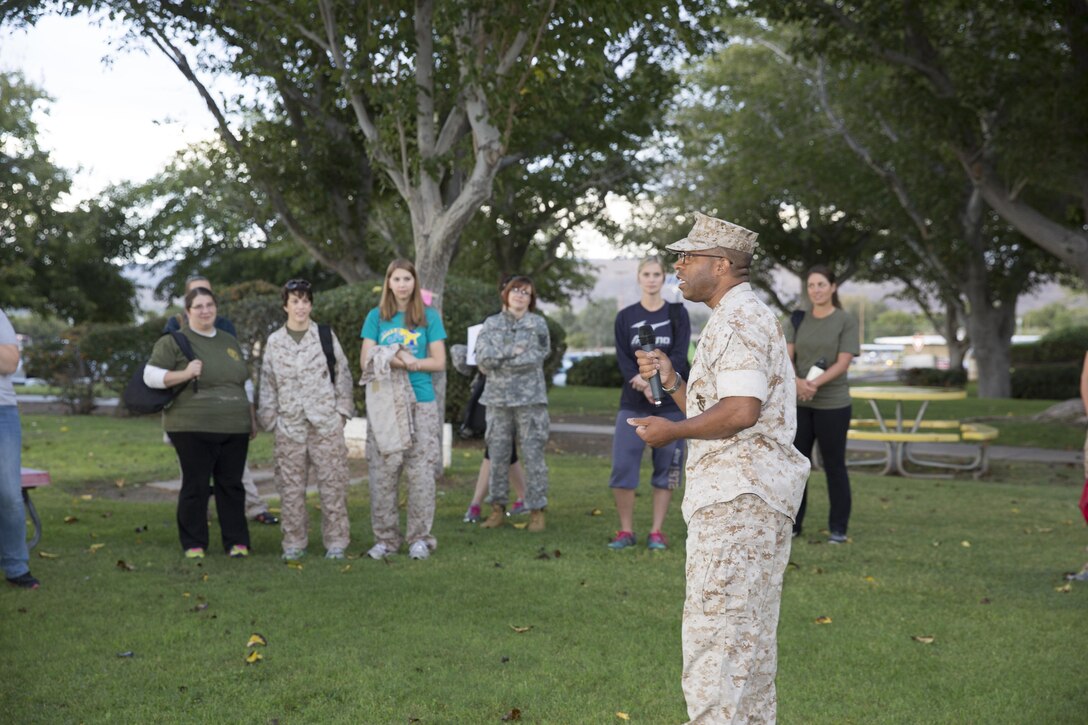 Col. Sekou S. Karega, Commanding Officer of Marine Corps Logistics Base Barstow, addresses Marine and Army spouses at the beginning of Jane Wayne Day aboard MCLB, October 15.  The is designed for spouses to spend the day as a Marine and included activities at the base obstacle course, rifle range, and maintenance facilities.