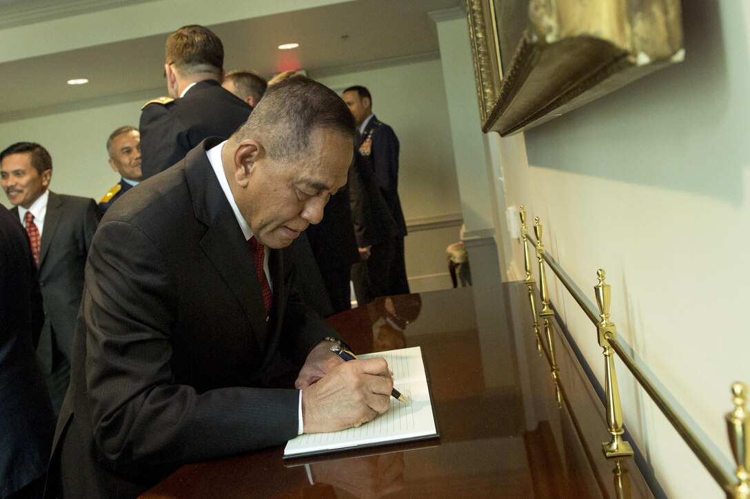 Indonesian Defense Minister Ryamizard Ryacudu signs the guest book as he arrives for a meeting with Defense Secretary Ash Carter at the Pentagon, Oct. 26, 2015. The two leaders met to discuss matters of mutual importance and to sign the Joint Statement on Comprehensive Defense Cooperation. DoD photo by U.S. Air Force Senior Master Sgt. Adrian Cadiz