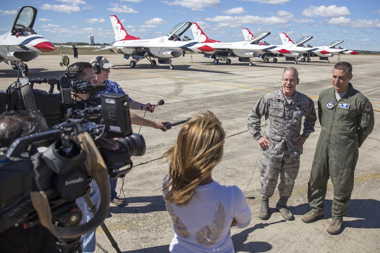 Brig. Gen. Bob Labrutta 502nd Air Base Wing and Joint Base San Antonio commander and Col. Mathew Isler 12th Flying Training Wing commander, answer questions from the media at Joint Base San Antonio-Randolph prior to the 2015 Joint Base San Antonio Air Show and Open House Oct. 26, 2015.  Air shows allow the Air Force to display the capabilities of our aircraft to the American taxpayer through aerial demonstrations and static displays.  Randolph’s air show allowed attendees to get up close and personal to see some of the equipment and aircraft used by the U.S. military today.
