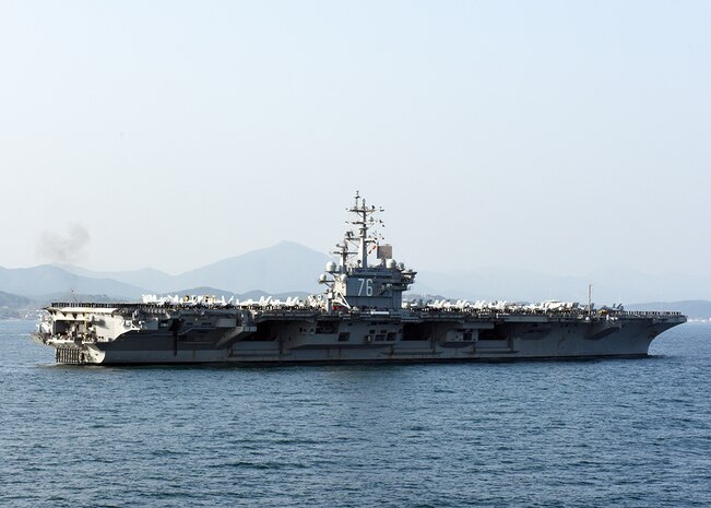BUSAN, Republic of Korea, (October 23, 2015) Sailors aboard the U.S. Navy's only forward-deployed aircraft carrier USS Ronald Reagan (CVN 76), man the rails while participating in the Republic of Korea Navy’s Fleet Review. The fleet review celebrated the 70th anniversary of the ROK Navy and served as a symbol of the enduring U.S. and ROK alliance. 