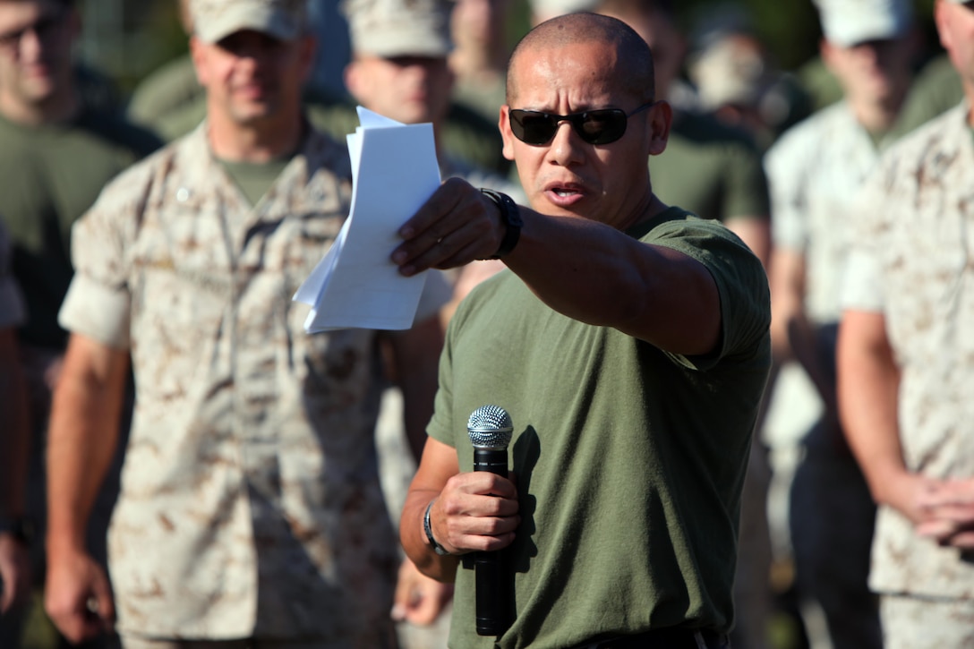 Staff Sgt. Julio Rodriguez conducts a safety brief during the semi-annual field meet between Headquarters and Headquarters Squadron and Marine Wing Headquarters Squadron 2 at Marine Corps Air Station Cherry Point, N.C., Oct. 23, 2015. Marines with H&HS and MWHS-2 went head-to-head in a tug-of-war, a 7-ton pull, relay races and other events to build teamwork and camaraderie. Rodriguez is the operations chief with MWHS-2. (U.S. Marine Corps photo by Lance Cpl. Jason Jimenez/Released)