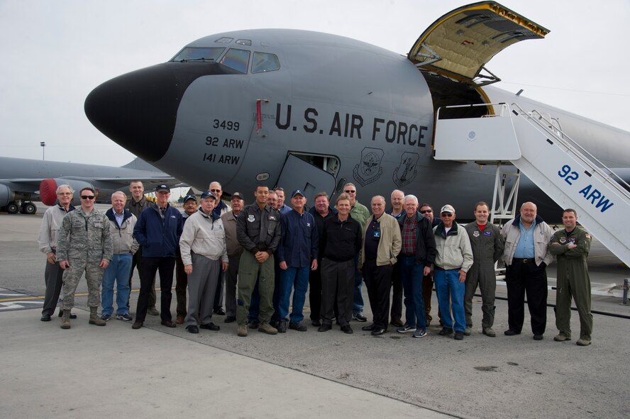 Tempe Diplomats from Arizona pose for a group photo with aircrew members during a base tour Oct. 23, 2015, at Fairchild Air Force Base, Wash. The Tempe Diplomats experienced the KC-135 Stratotanker and learned about Fairchild’s air refueling mission. (U.S. Air Force photo/Airman 1st Class Nick J. Daniello)