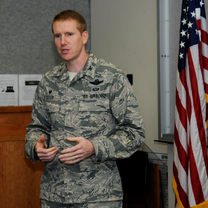 Oregon Air National Guard Col. Adam Sitler, 142nd Fighter Wing Operations Group (OPS) commander, discusses the expanded mission of the OPS group, Portland Air National Guard Base, Ore., Sept. 18, 2015. (U.S. Air National Guard photo by Tech. Sgt. John Hughel, 142nd Fighter Wing Public Affairs/released)