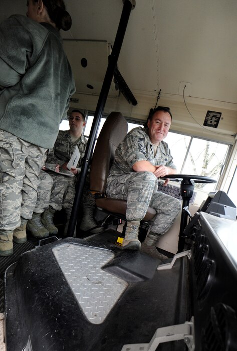 Prior to become the 142nd Fighter Wing Command Chief Master Sergeant, Chief Master Sgt. Chris Roper was the senior enlisted advisor for the Combat Operations Group. Roper assisted a base tour on Dec. 14, 2014, helping drive and shuttle visitors as a bus driver, Portland Air National Guard Base, Ore. (U.S. Air National Guard photo by Tech. Sgt. John Hughel, 142nd Fighter Wing Public Affairs)