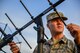 Airman 1st Class Brandon Martin, 1st Combat Communications Squadron tactical network operations technician, adjusts an AV-211 Antenna Oct. 5, 2015, at Diyarbakir Air Base, Turkey. The AV-211z Antenna is an air to ground antenna used for communications back to the 1st CBCS in Ramstein, Germany. (U.S. Air Force photo by Airman 1st Class Cory W. Bush/Released)