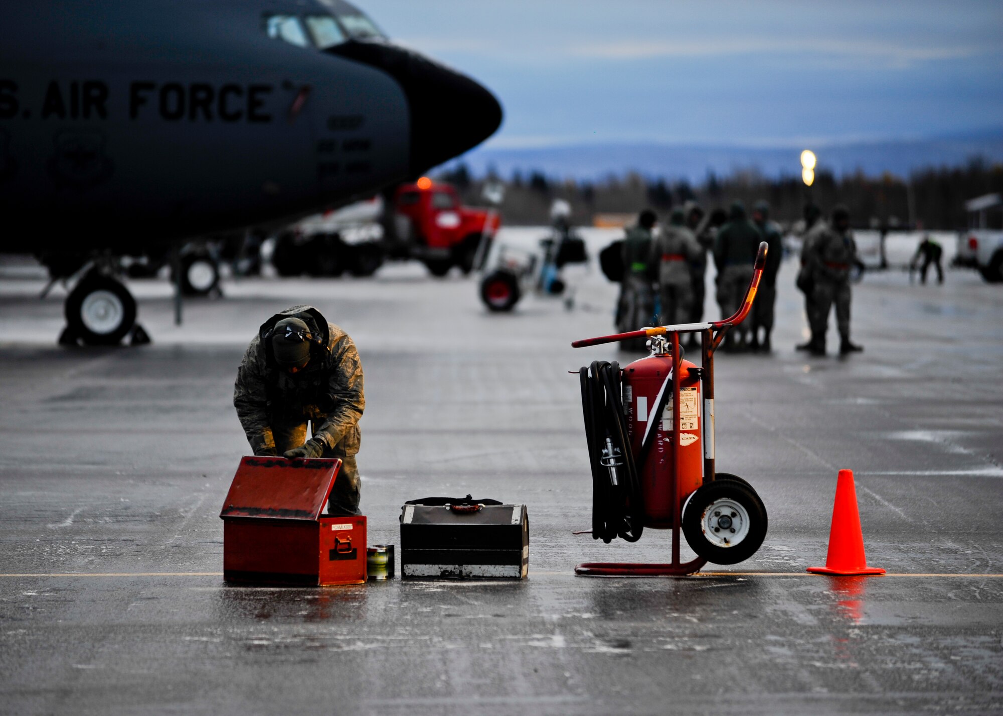 Senior Airman Jeysson Conde-Guevara, 92nd Aircraft Maintenance Squadron crew chief, checks his gear before conducting a pre-flight inspection on a KC-135 Stratotanker, Oct. 19, 2015, at 5 Wing Goose Bay, Canada. From Oct. 15 - 26, 2015, approximately 700 members from the Canadian Armed Forces, United States Air Force, United States Navy, and United States Air National Guard are deploying to Iqaluit, Nunavut, and 5 Wing Goose Bay, Newfoundland and Labrador for Exercise Vigilant Shield 16. (U.S. Air Force photo by Senior Airman Victor J. Caputo)