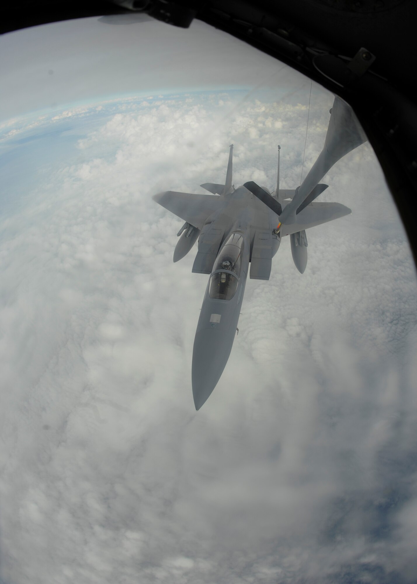 An F-15C Eagle assigned to the 144th Fighter Wing, Fresno Air National Guard Base, Calif., receives fuel from a KC-135 Stratotanker assigned to McConnell Air Force Base, Kan., Oct. 24, 2015. The KC-135 has provided the core aerial refueling capability for the United States Air Force for more than 50 years. (U.S. Air Force photo/Senior Airman Victor J. Caputo)